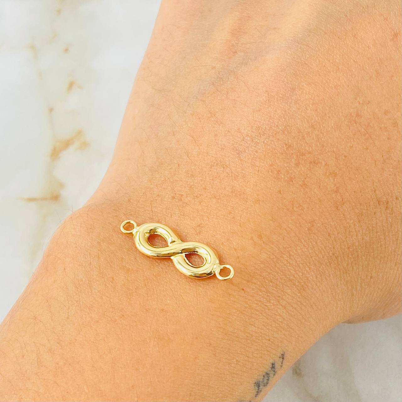 Charm Infinity 0.7 g / 1 in Yellow Gold 18K