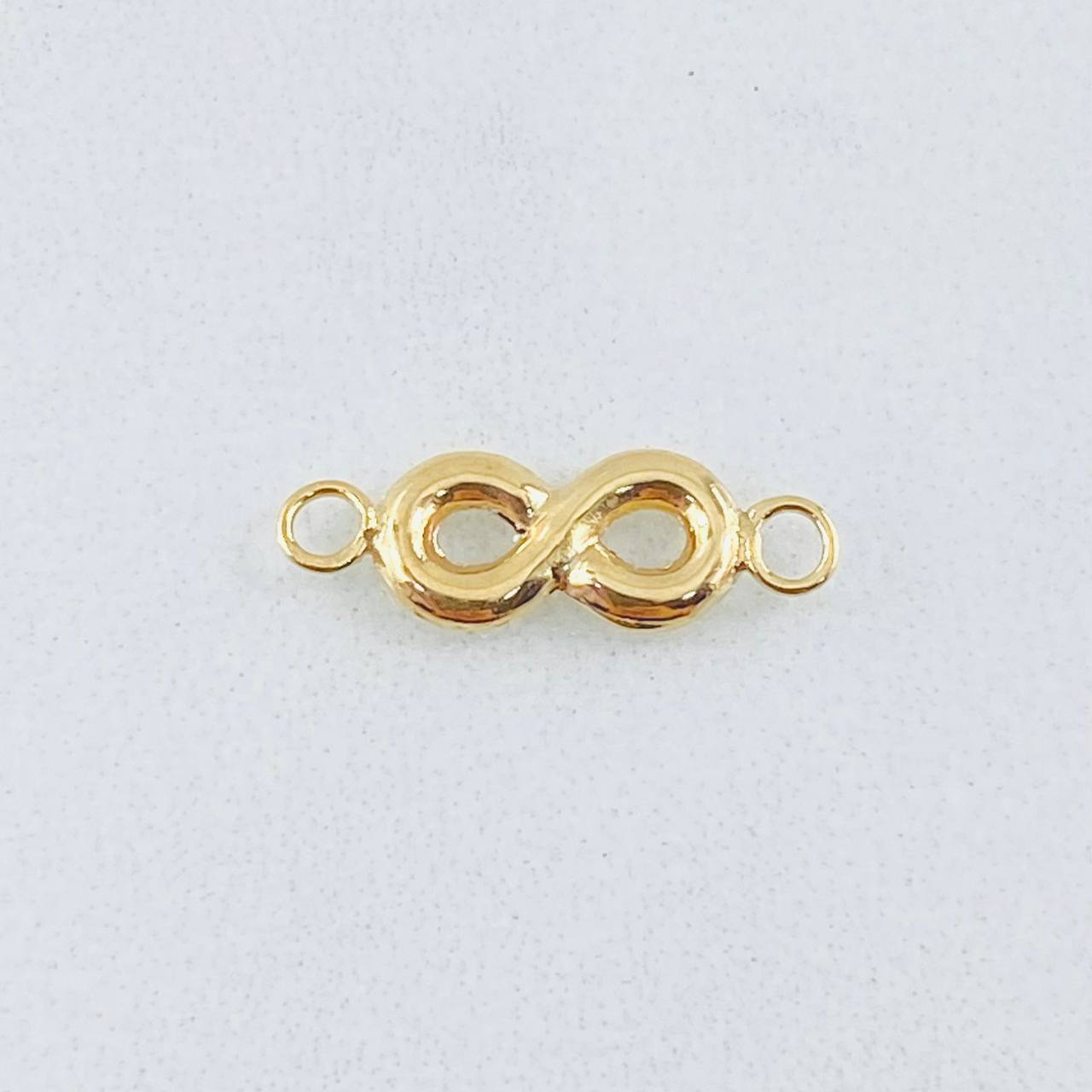 Herraje Infinito 0.4gr / 3/4 in / Oro Amarillo 18K ©