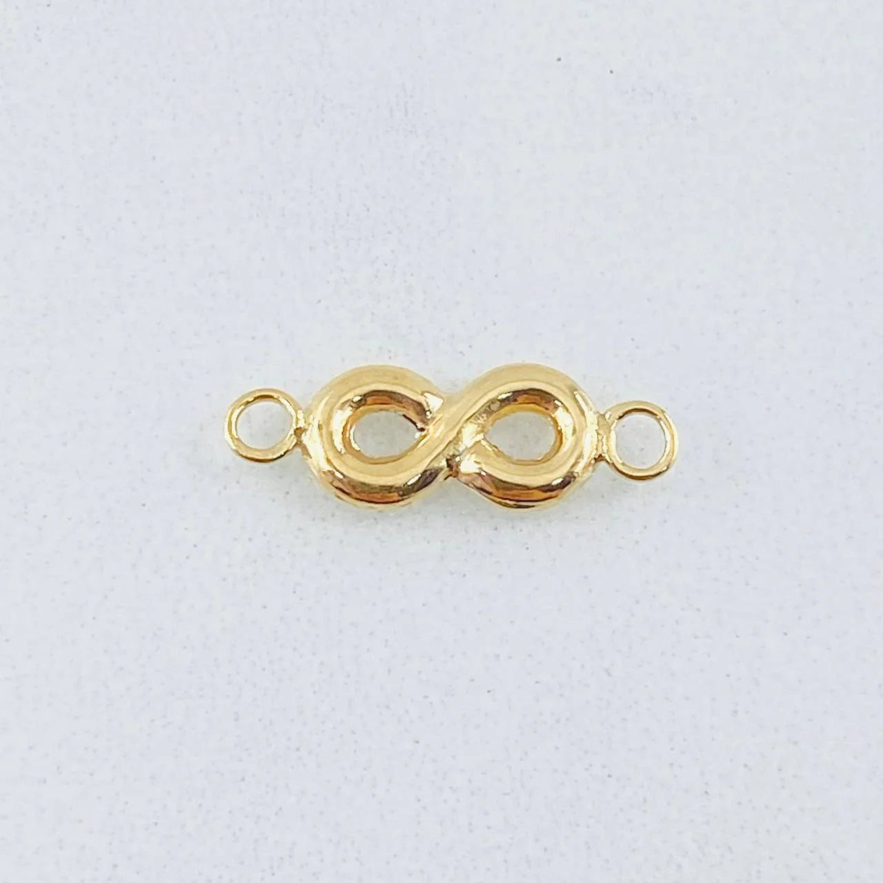 Herraje Infinito 0.45g / 1 in Oro Amarillo 18K