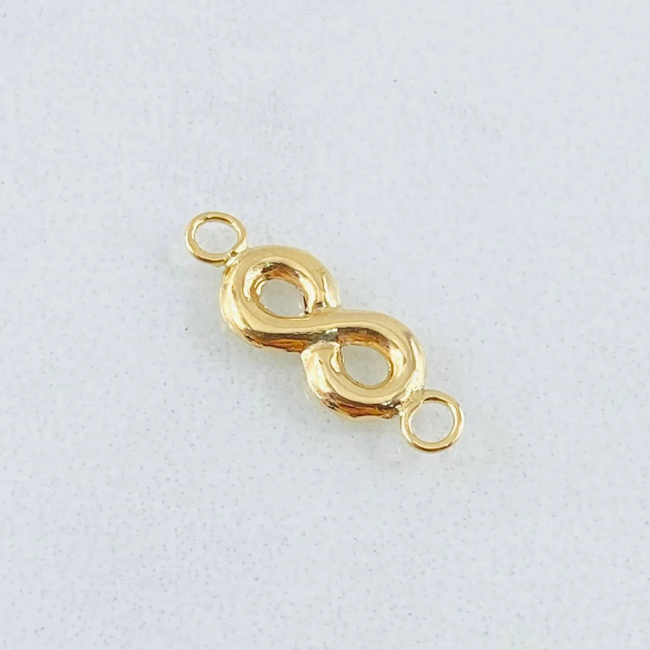 Herraje Infinito 0.45g / 1 in Oro Amarillo 18K