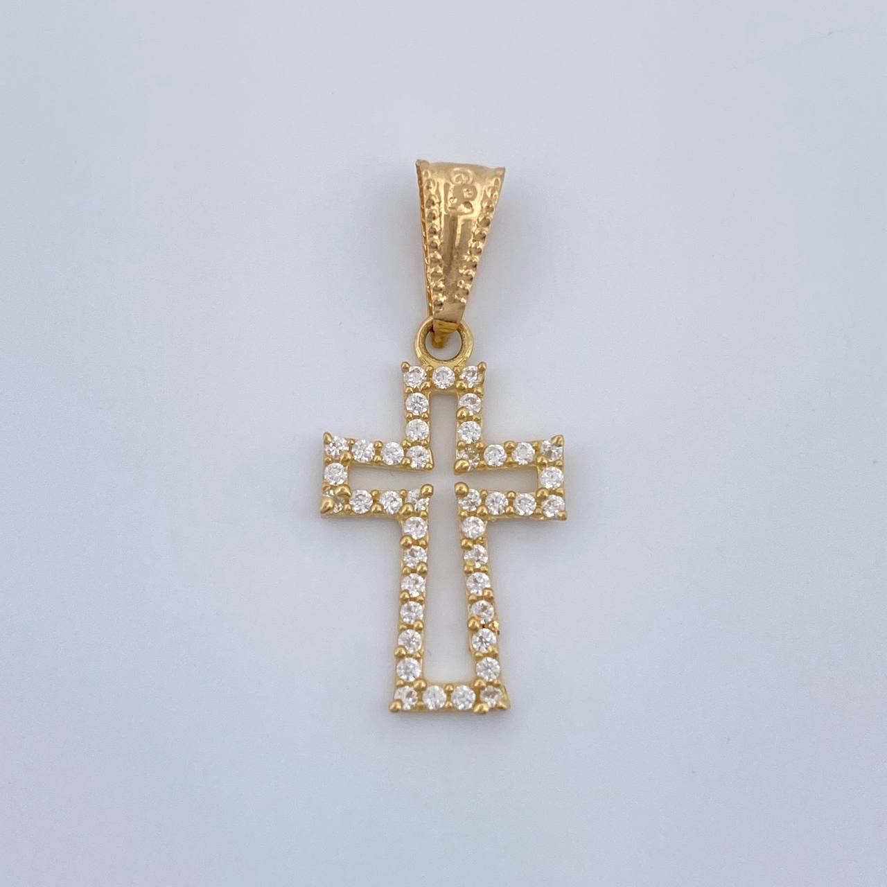 Dije Cruz 0.65gr / 1 in / Oro Amarillo 18K %
