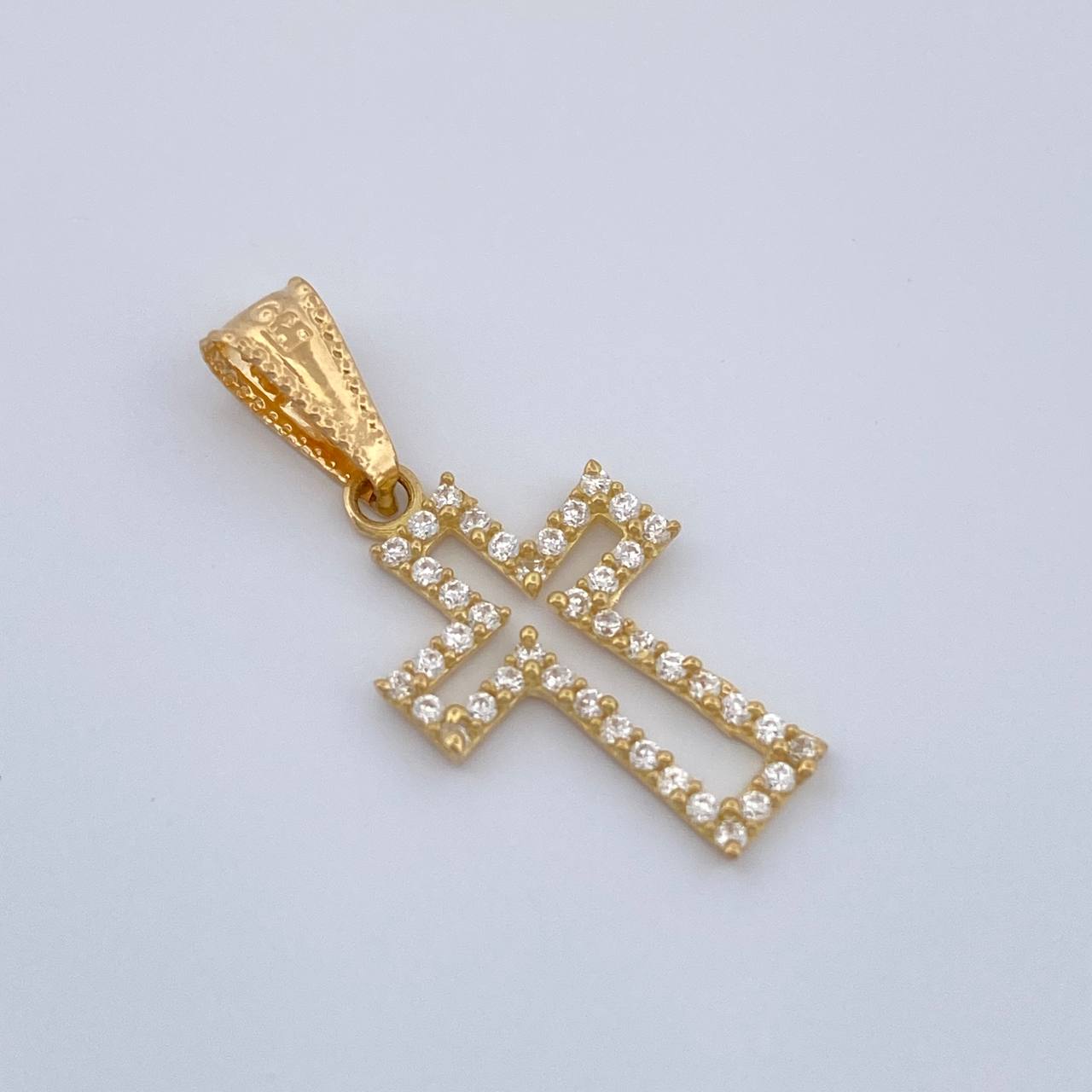 Dije Cruz 0.65gr / 1 in / Oro Amarillo 18K %