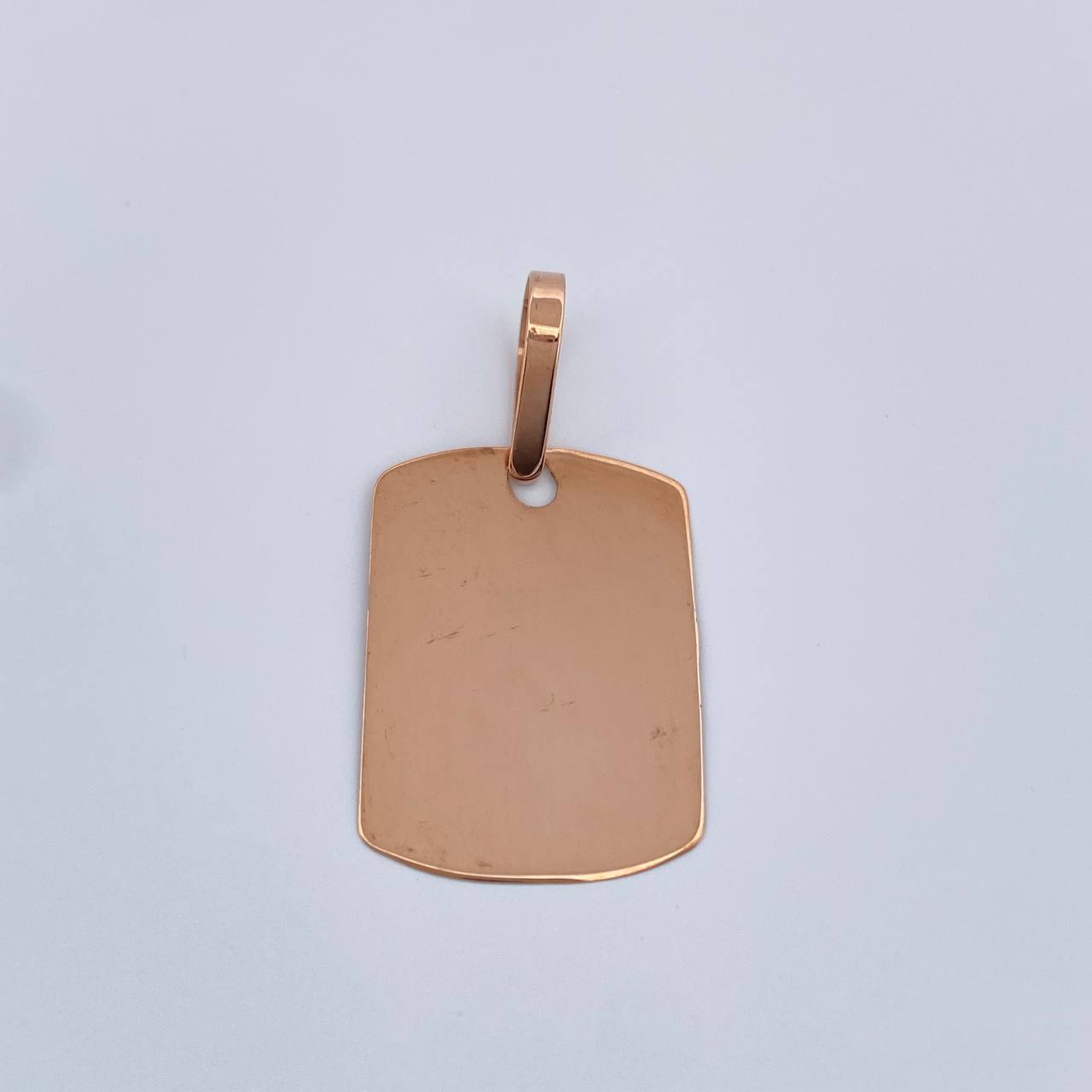 Dije Placa 0.8gr / 1 in / Oro Rosa 18K $