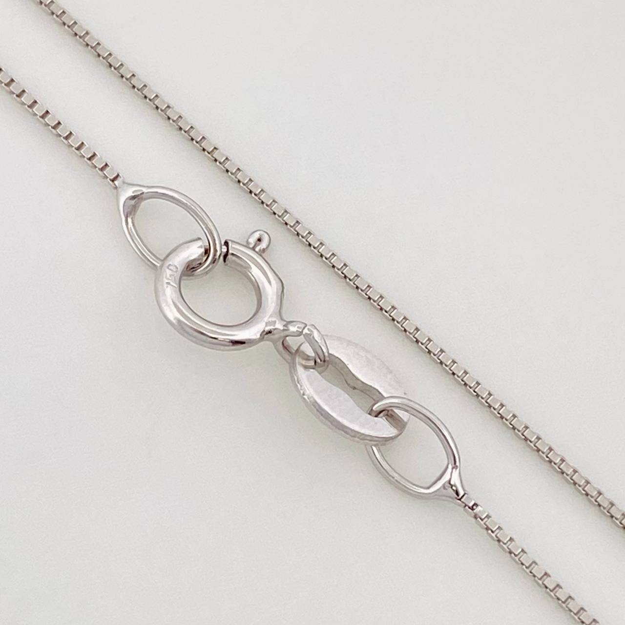 Set Cadena Veneciana + Dije Ancla Esmeralda 0.7pts / 1.5g / 18 in Oro Blanco 18K