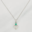 Set Cadena Veneciana + Dije Corazon Partido Esmeralda 0.7pts / 1.45g / 18 in Oro Blanco 18K