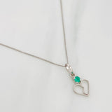 Set Cadena Veneciana + Dije Corazon Partido Esmeralda 0.7pts / 1.45g / 18 in Oro Blanco 18K