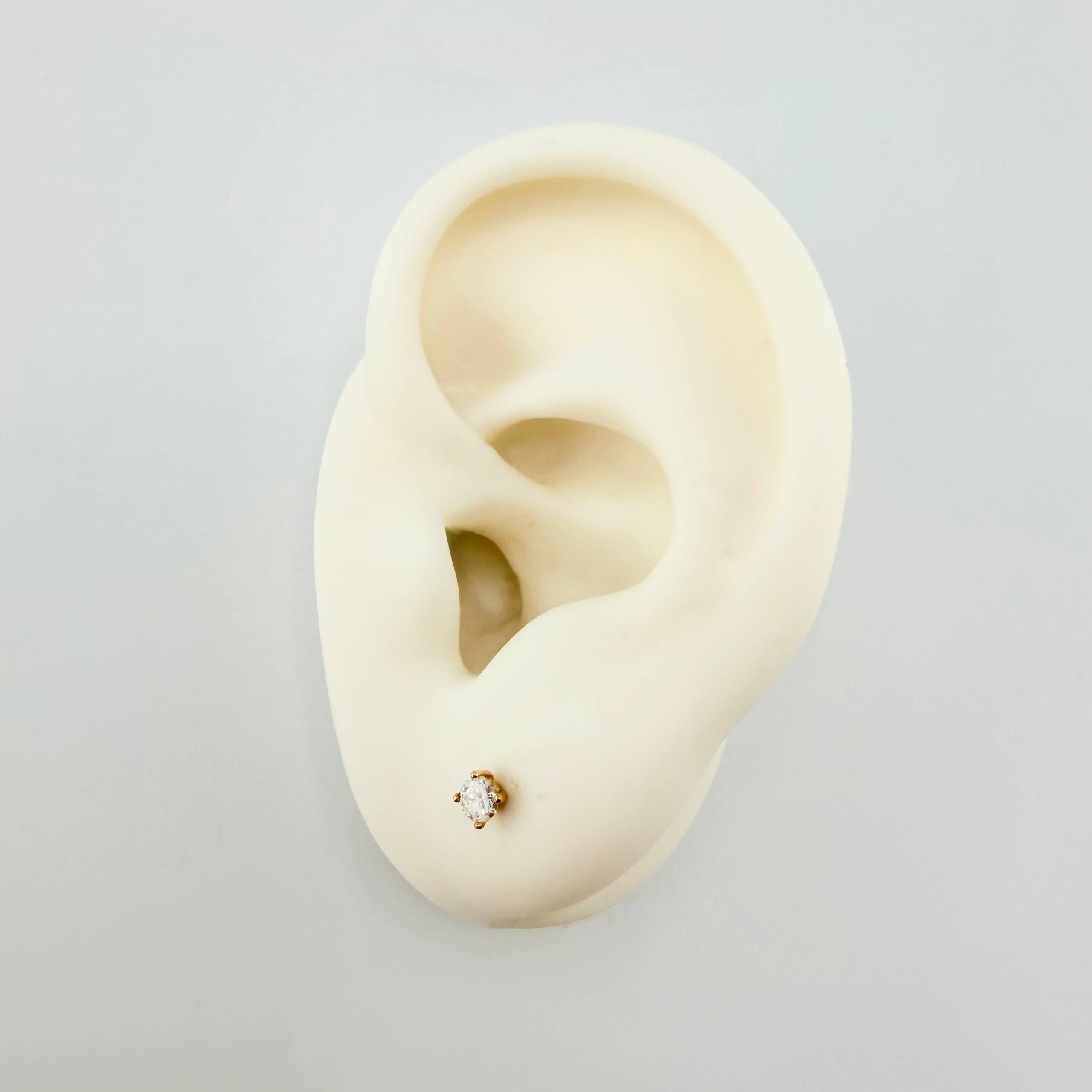 Topos Cuatro Garras Diamantes 16pts 0.55gr / 3mm Oro Amarillo 18K