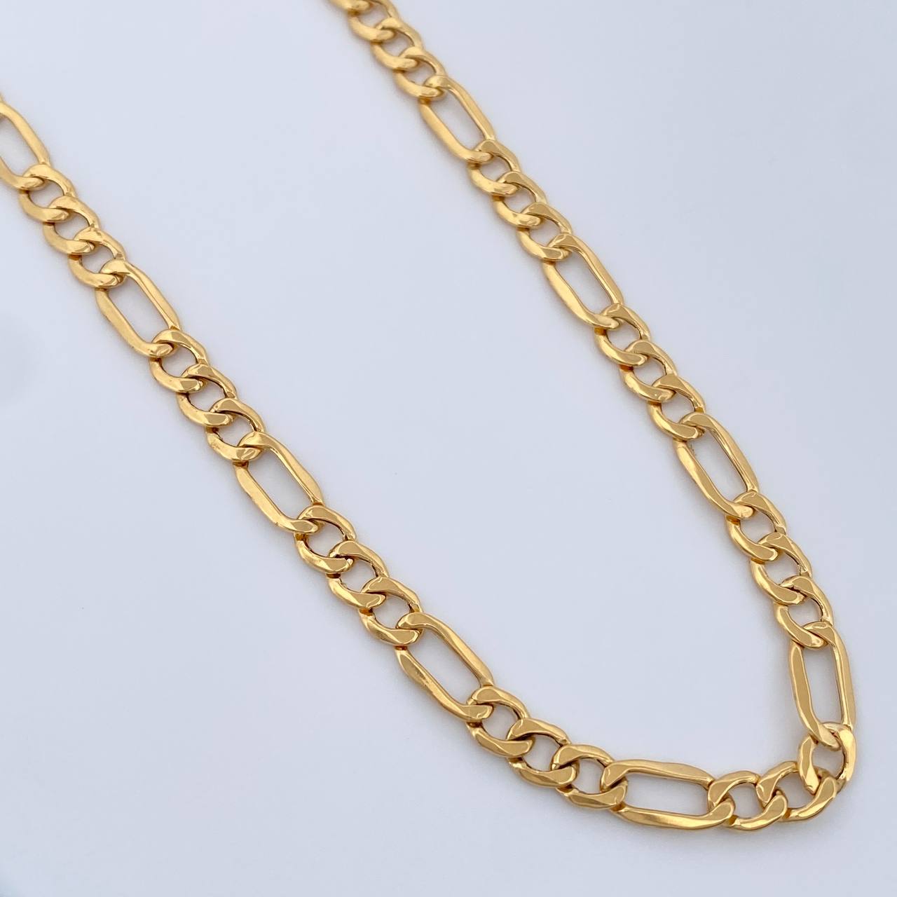 Cadena Figaro 9.25gr / 23 3/4 in / 4.13mm Oro Amarillo +1 18K $