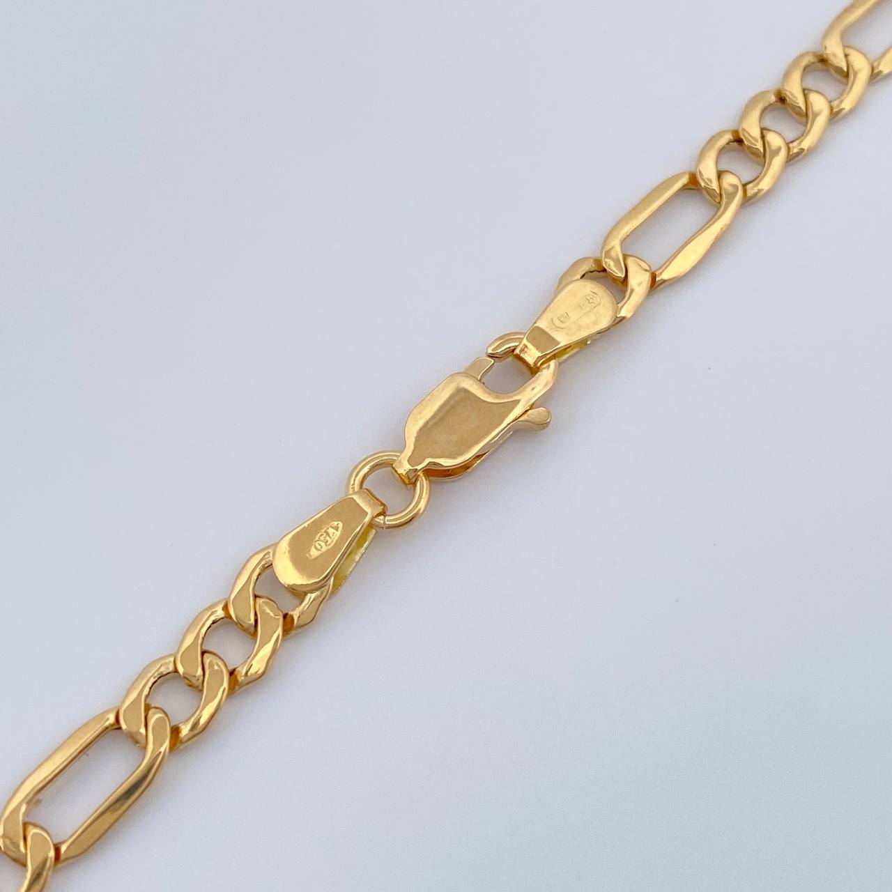 Cadena Figaro 8.85gr / 23 3/4 in / 4mm Oro Amarillo +1 18K $