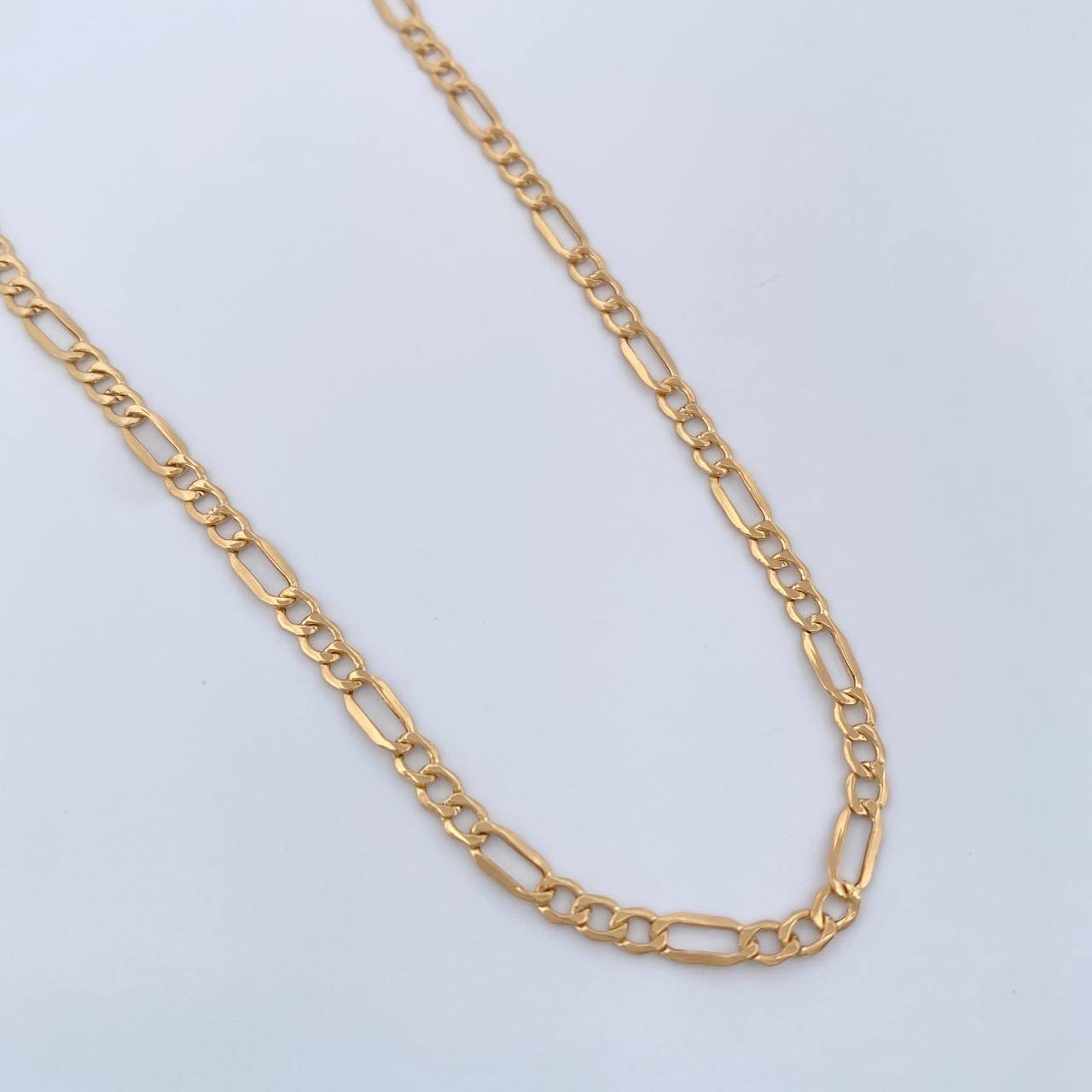 Cadena Figaro 1.7gr / 18 in / 2.38mm Oro Amarillo +1 18K $