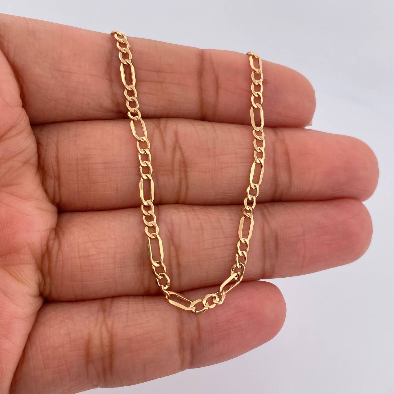 Cadena Figaro 1.7gr / 18 in / 2.38mm Oro Amarillo +1 18K $