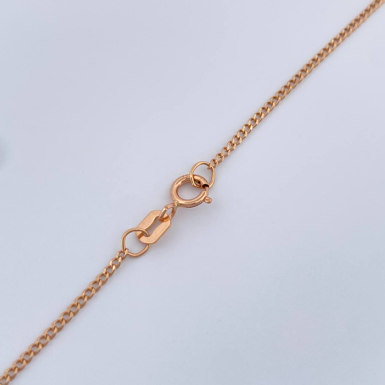 Cadena Mini Cubana 1.4gr / 23 1/2 in / 1.29mm Oro Rosa +1 18K &