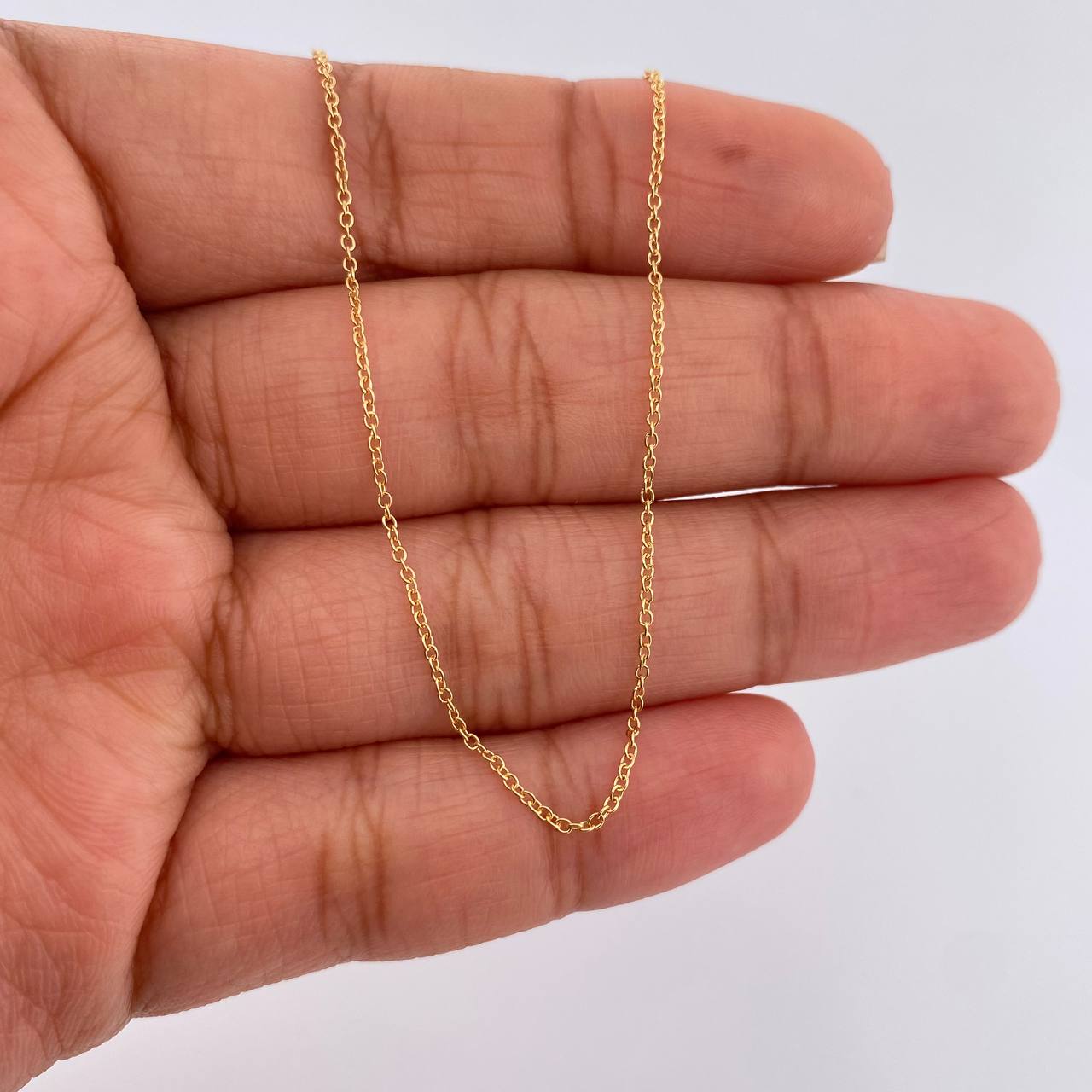 Cadena Aro Seguido 1.3gr / 18 in / 0.9mm Oro Amarillo +3 18K $