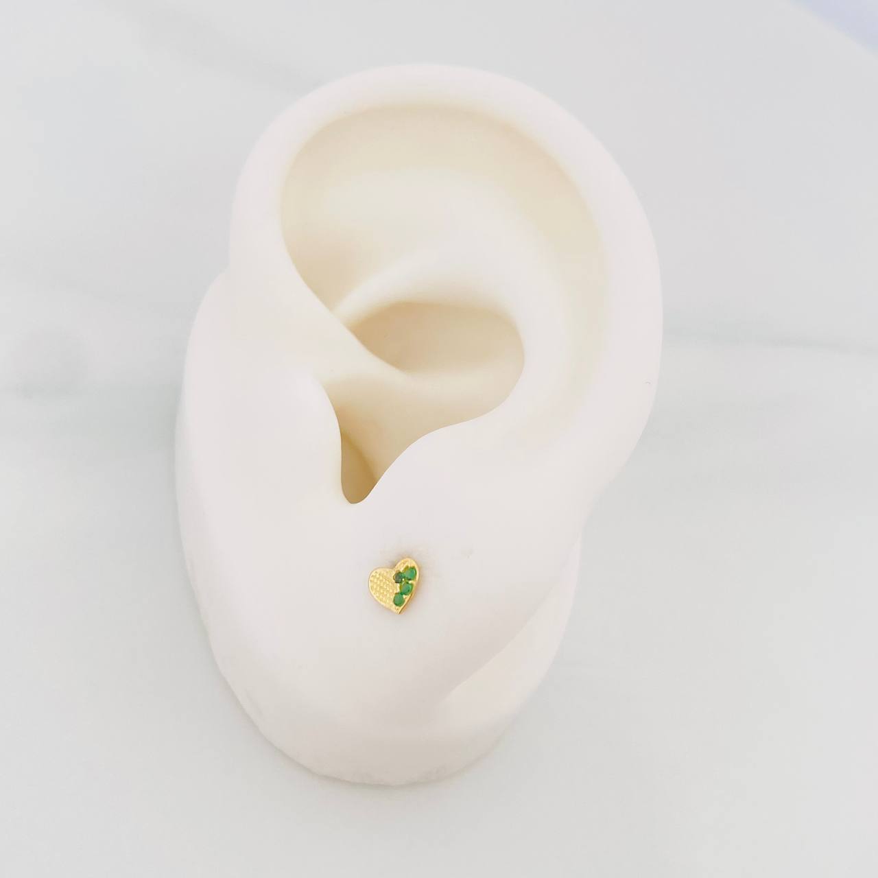 Topos Corazón Medio Destello 0.6 g / in / 1.25 mm Oro Amarillo 18K