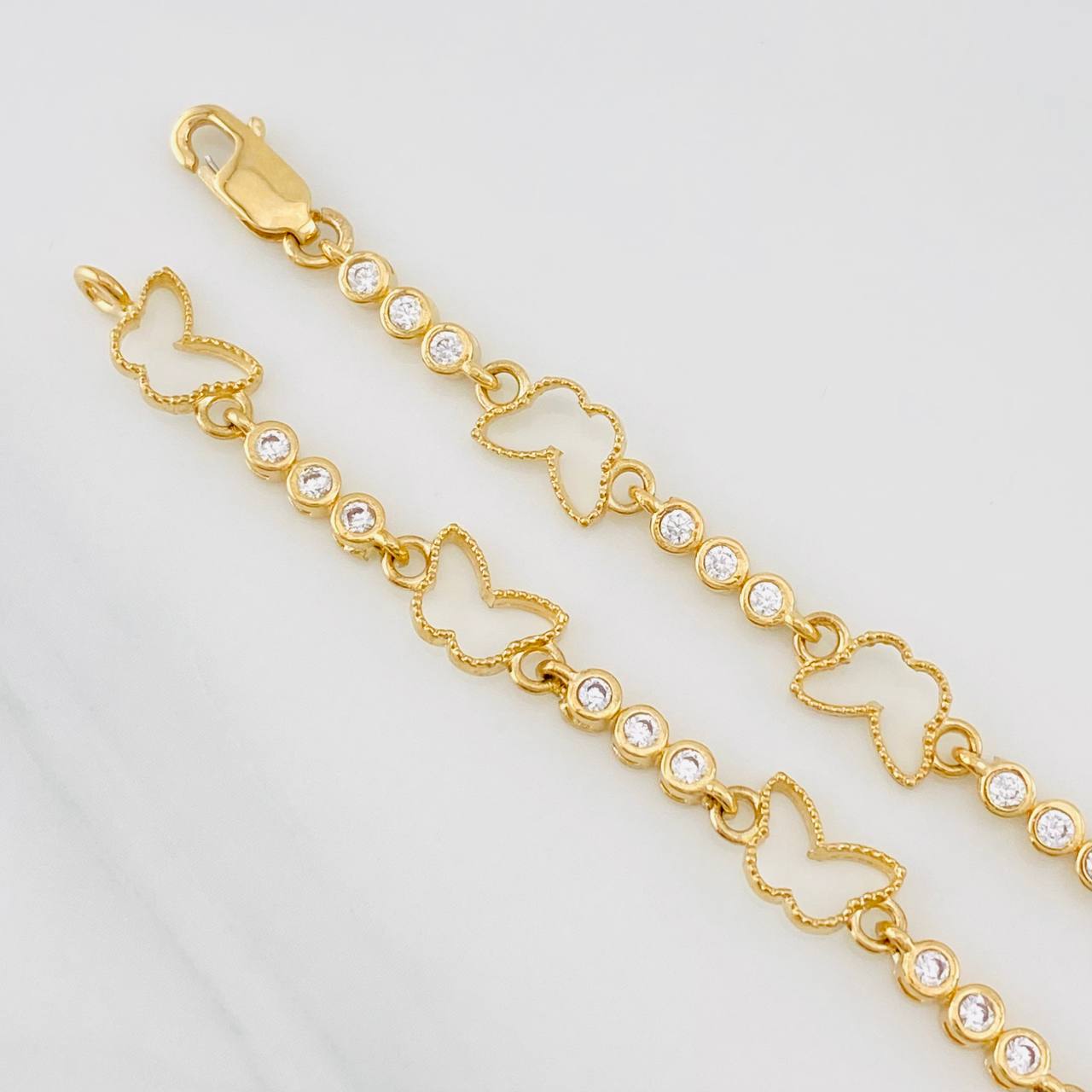 Pulso Mariposas 5.45g / 6 3/4 in / 2.7mm Oro Amarillo  Nac Esp 18K
