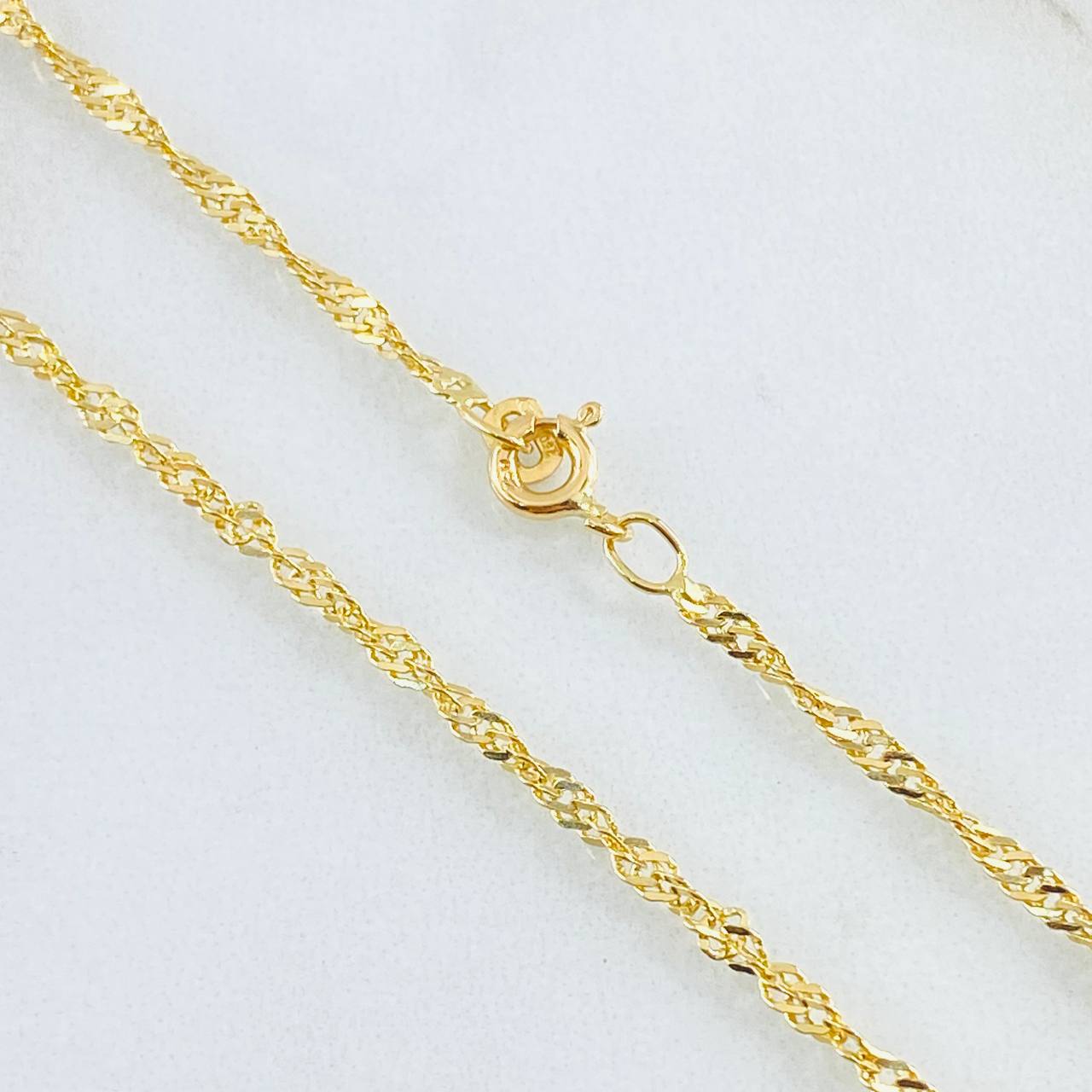 Cadena Singapur 5.05gr / 23 1/2 in / Oro Amarillo +3 18K ©