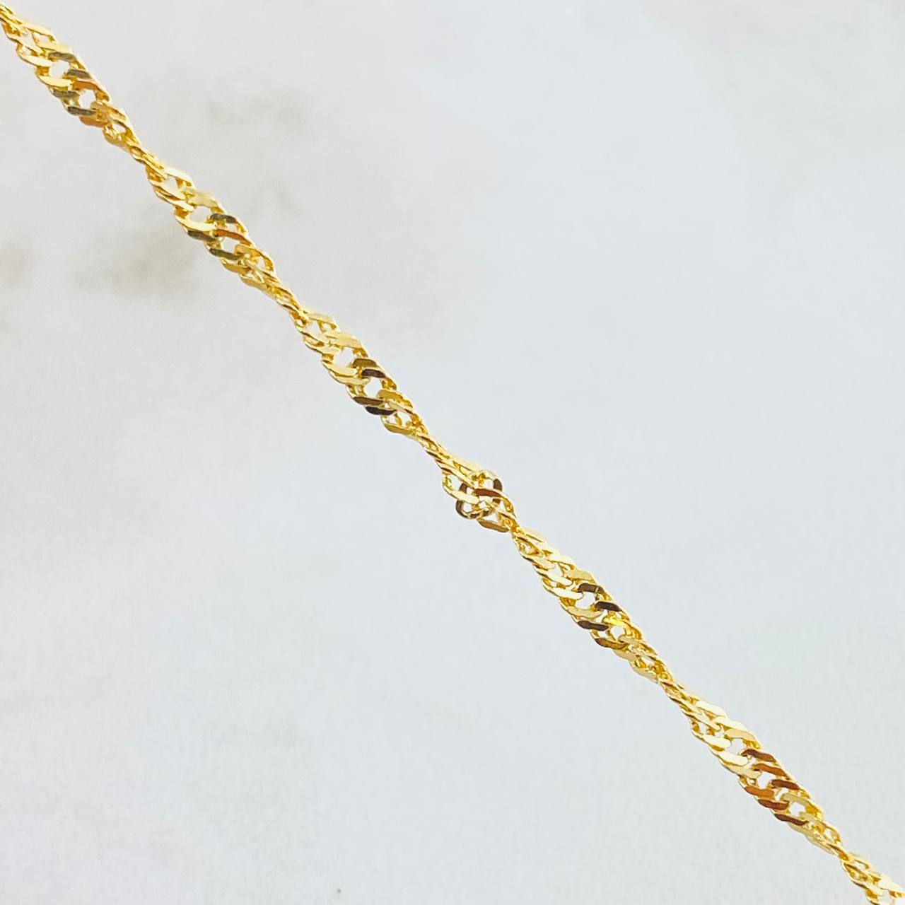 Cadena Singapur 5.05gr / 23 1/2 in / Oro Amarillo +3 18K ©