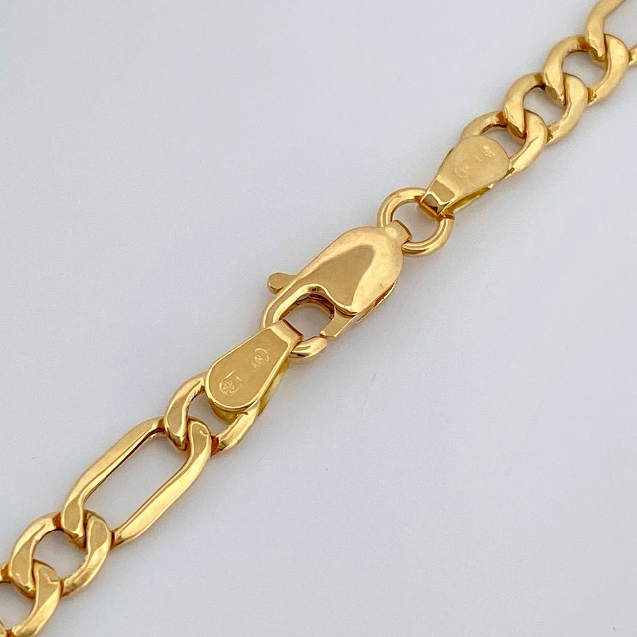 Cadena Figaro 9.1gr / 23 1/2 in / 4.37mm Oro Amarillo +1 18K %