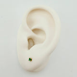 Topos Chispa Cuatro Garras Esmeraldas pts 0.7gr / 1.5mm Oro Amarillo 18K *