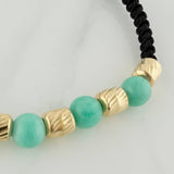 Pulsera Tejida Negra Morralla Esmeralda 5Uni Oro Amarillo 18K