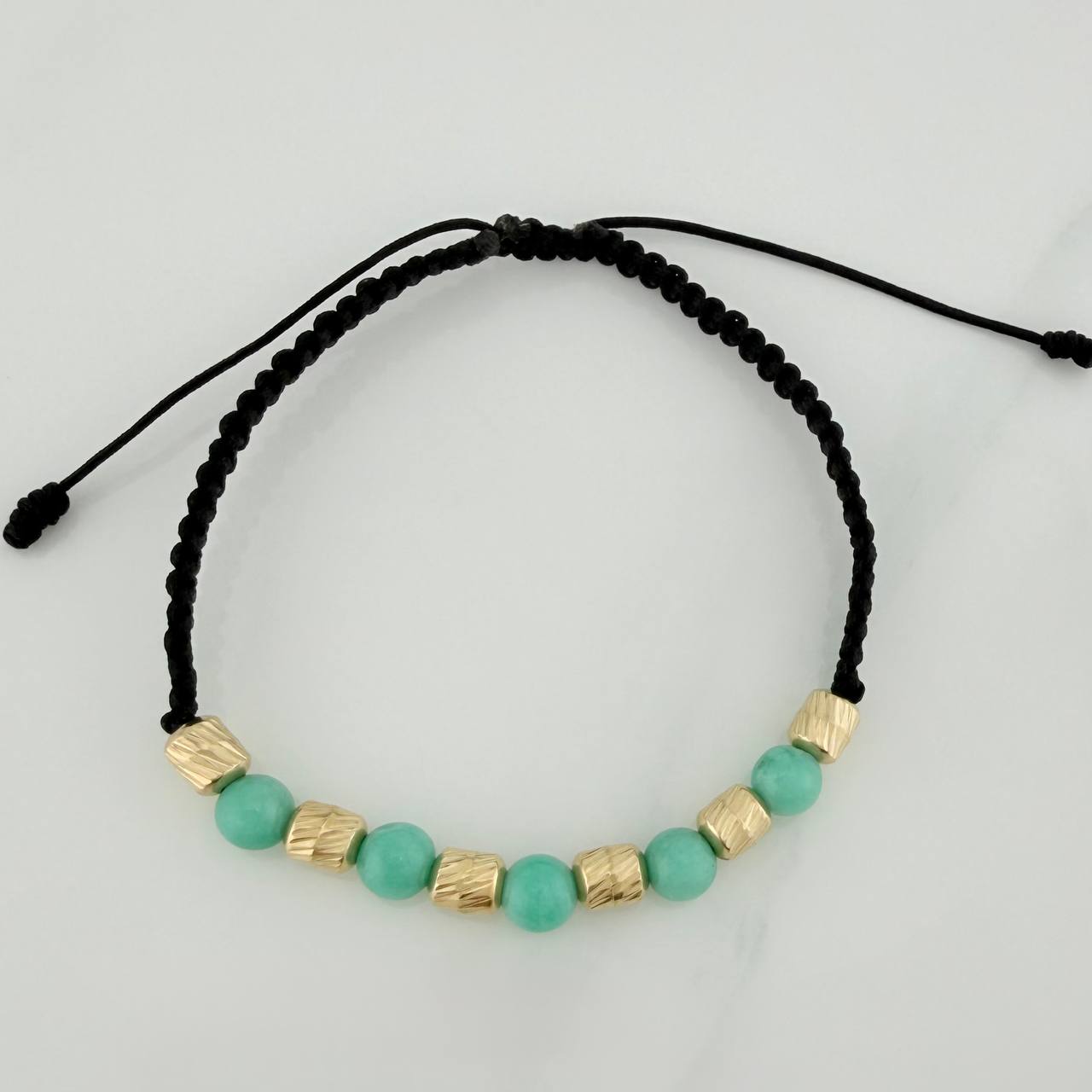 Pulsera Tejida Negra Morralla Esmeralda 5Uni Oro Amarillo 18K