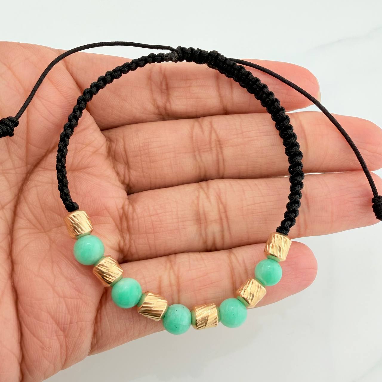 Pulsera Tejida Negra Morralla Esmeralda 5Uni Oro Amarillo 18K
