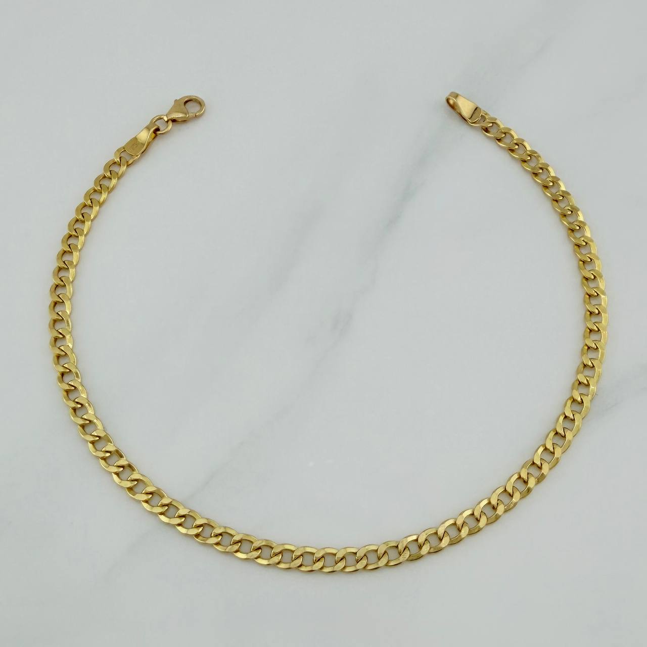 Pulso Cubano 2.6 g / 7 3/4 in / 1.2 mm Oro Amarillo 18K