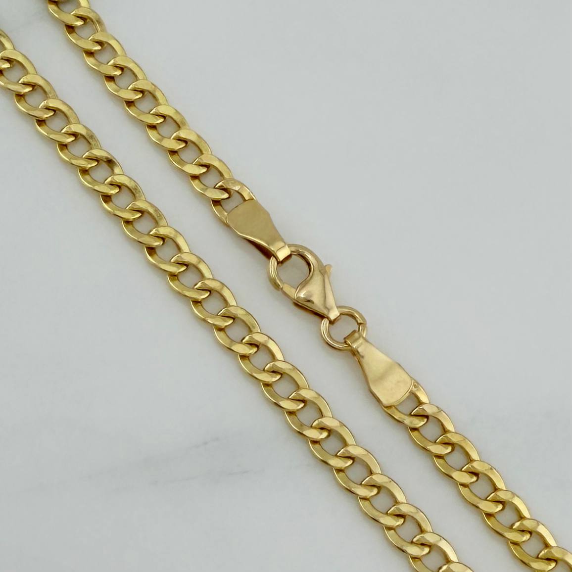 Pulso Cubano 2.6 g / 7 3/4 in / 1.2 mm Oro Amarillo 18K