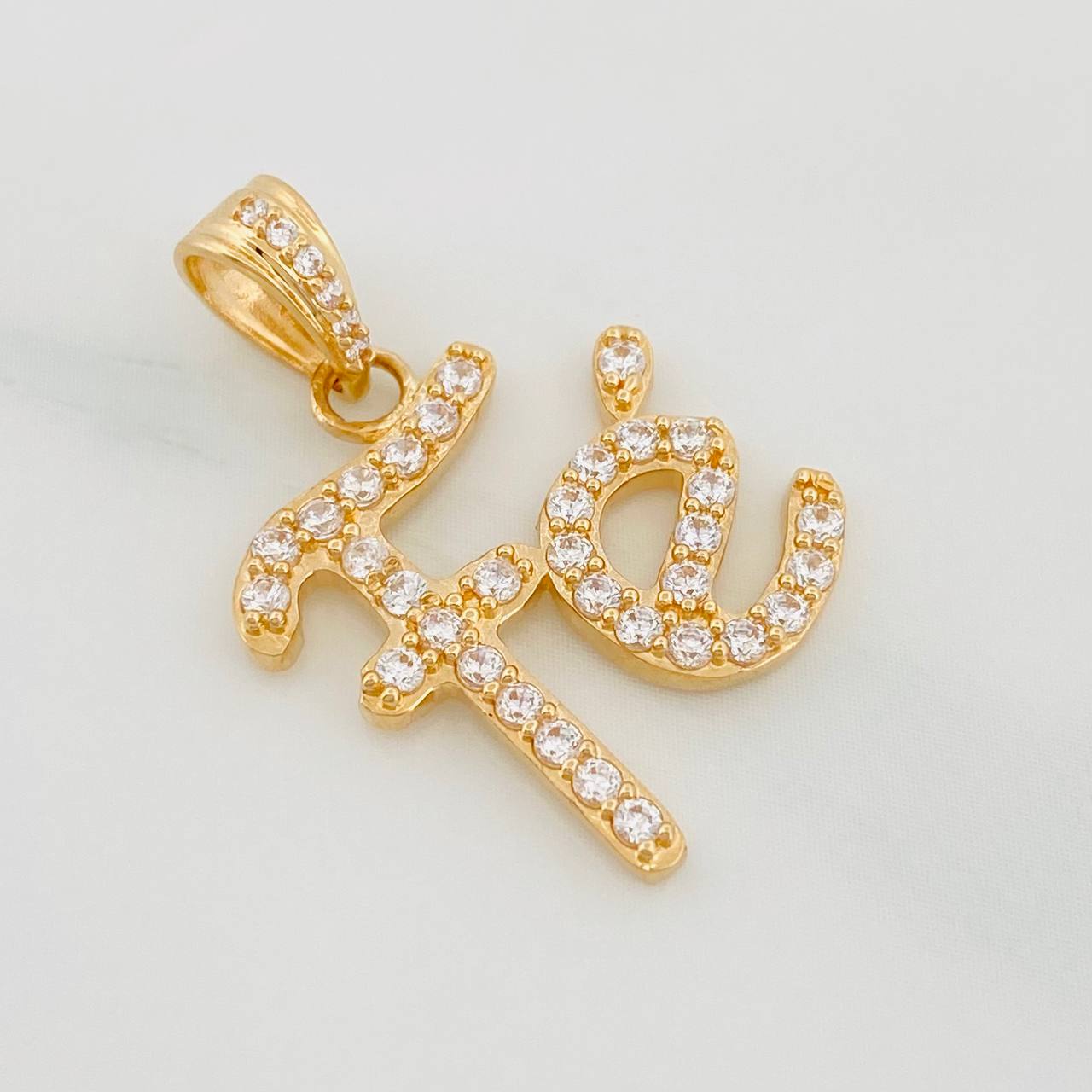 Dije Fe 2.35 g / 3/4 in Oro Amarillo 18K