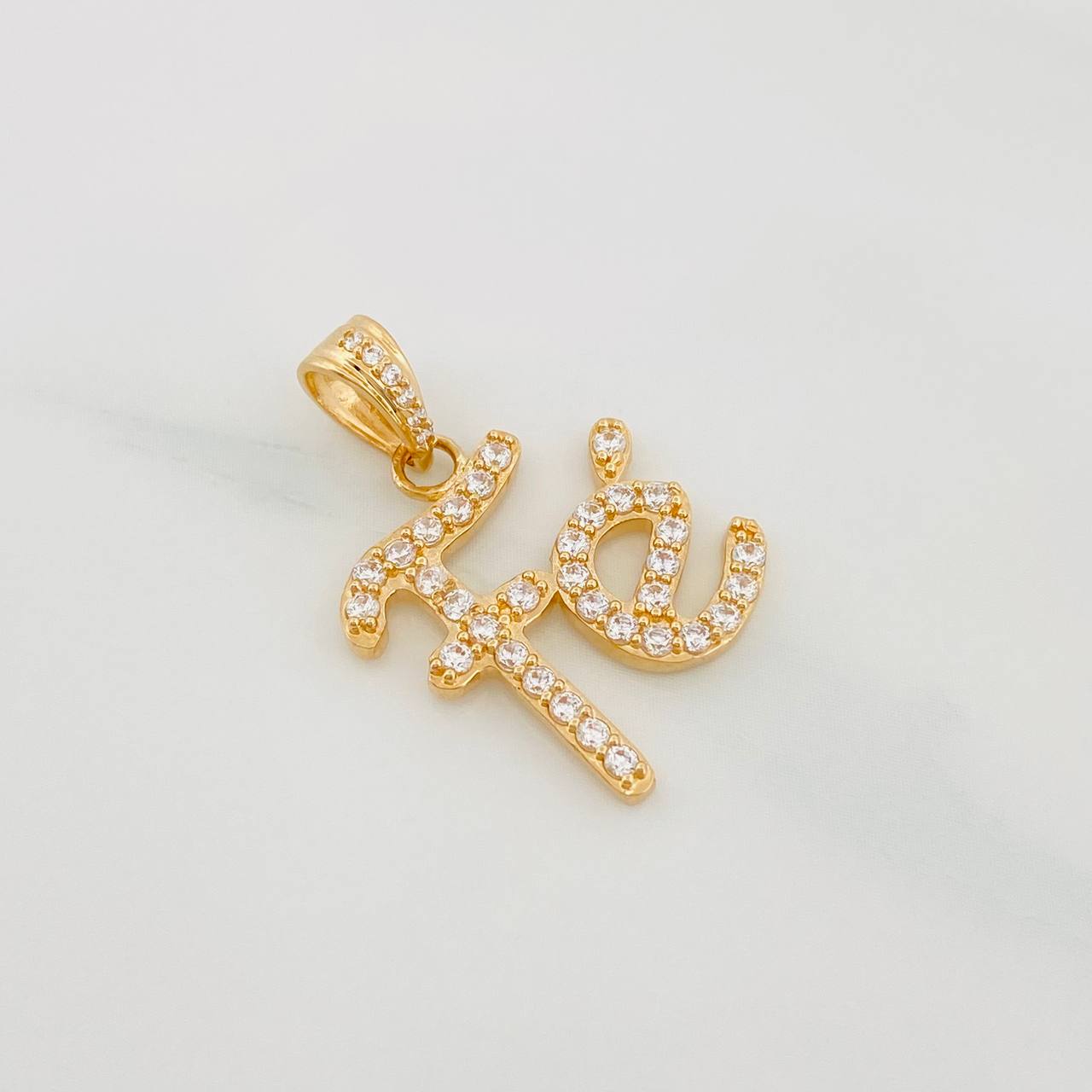 Dije Fe 2.35 g / 3/4 in Oro Amarillo 18K