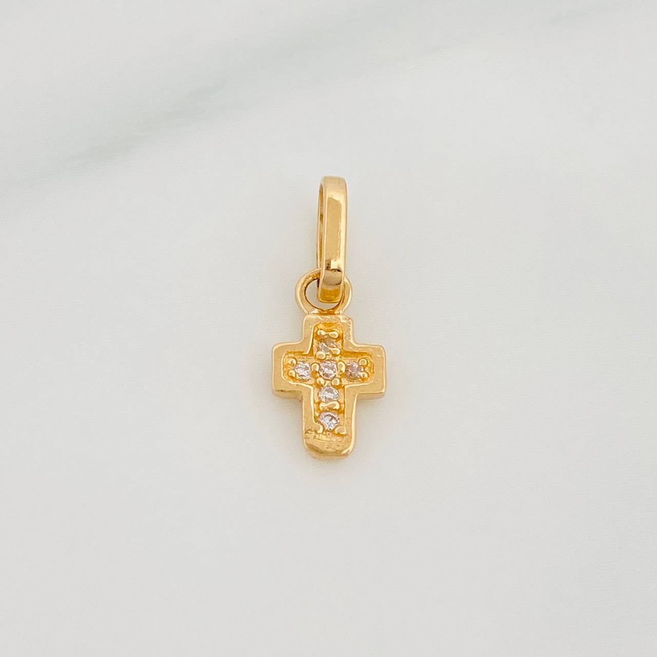 Dije Cruz 0.55 g / 1/2 in Oro Amarillo 18K