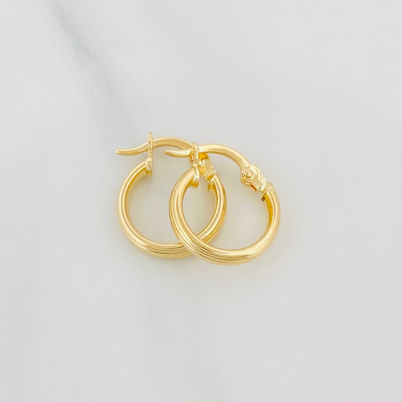 Candongas Andy 1.1 g / 1/2 in Oro Amarillo 18K