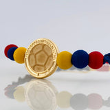 Pulsera Tejida Tricolor Herraje Balon Oro Amarillo 18K
