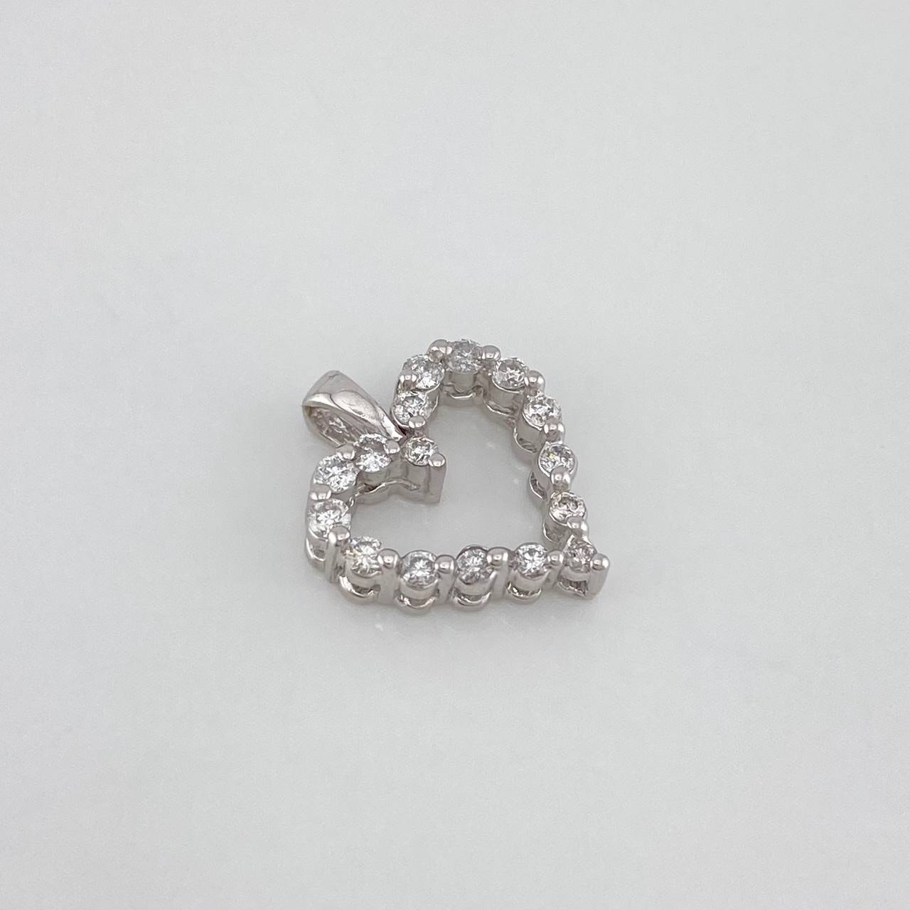 Dije Corazon 1.4 g / 1/2 in Oro Blanco 18K