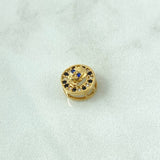 Charm Skull In Hoop 1.05gr / 1cm / White Zircons. Black And Blue 18K Yellow Gold ©