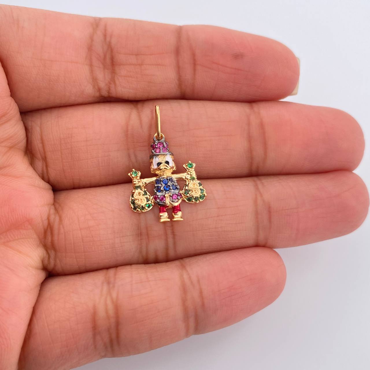 Dije Pato Bolsas Dinero 1.55gr / 1 in / Dos Oros Negro Amarillo 18K %