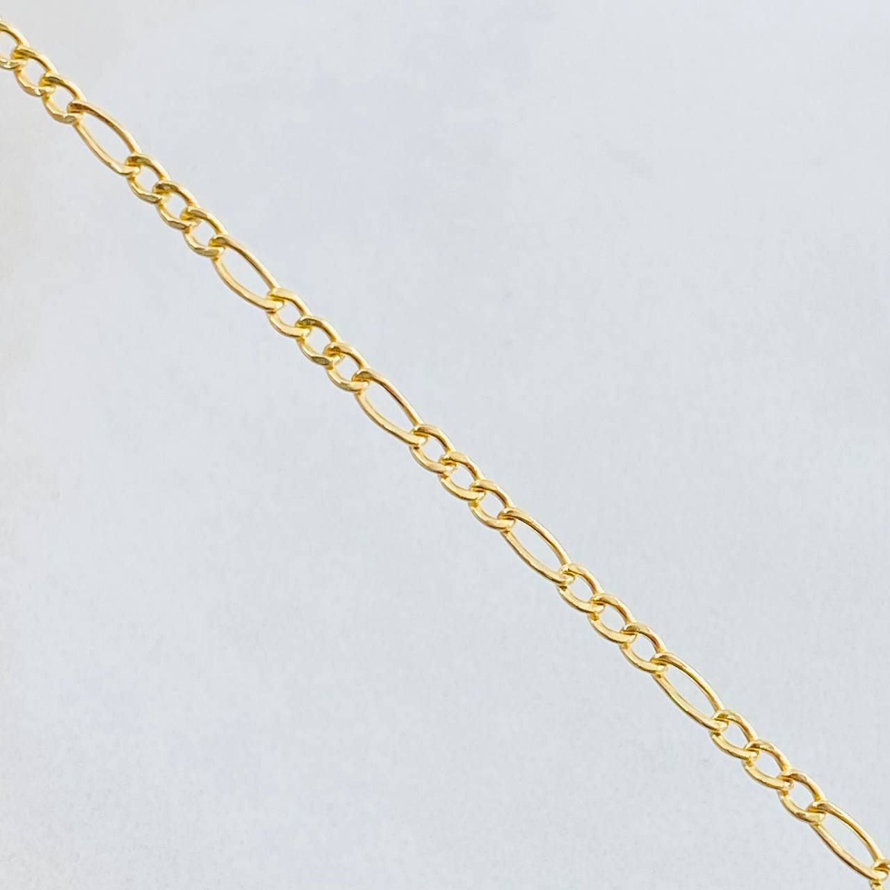 Pulso Figaro 0.7gr / 7 1/2 in / Oro Amarillo +1 18K