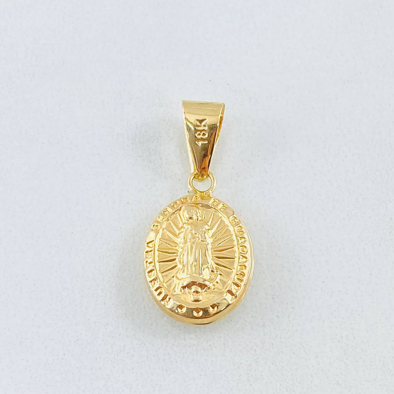 Dije Virgen Guadalupe 0.85gr / 1 in / Oro Amarillo 18K ©