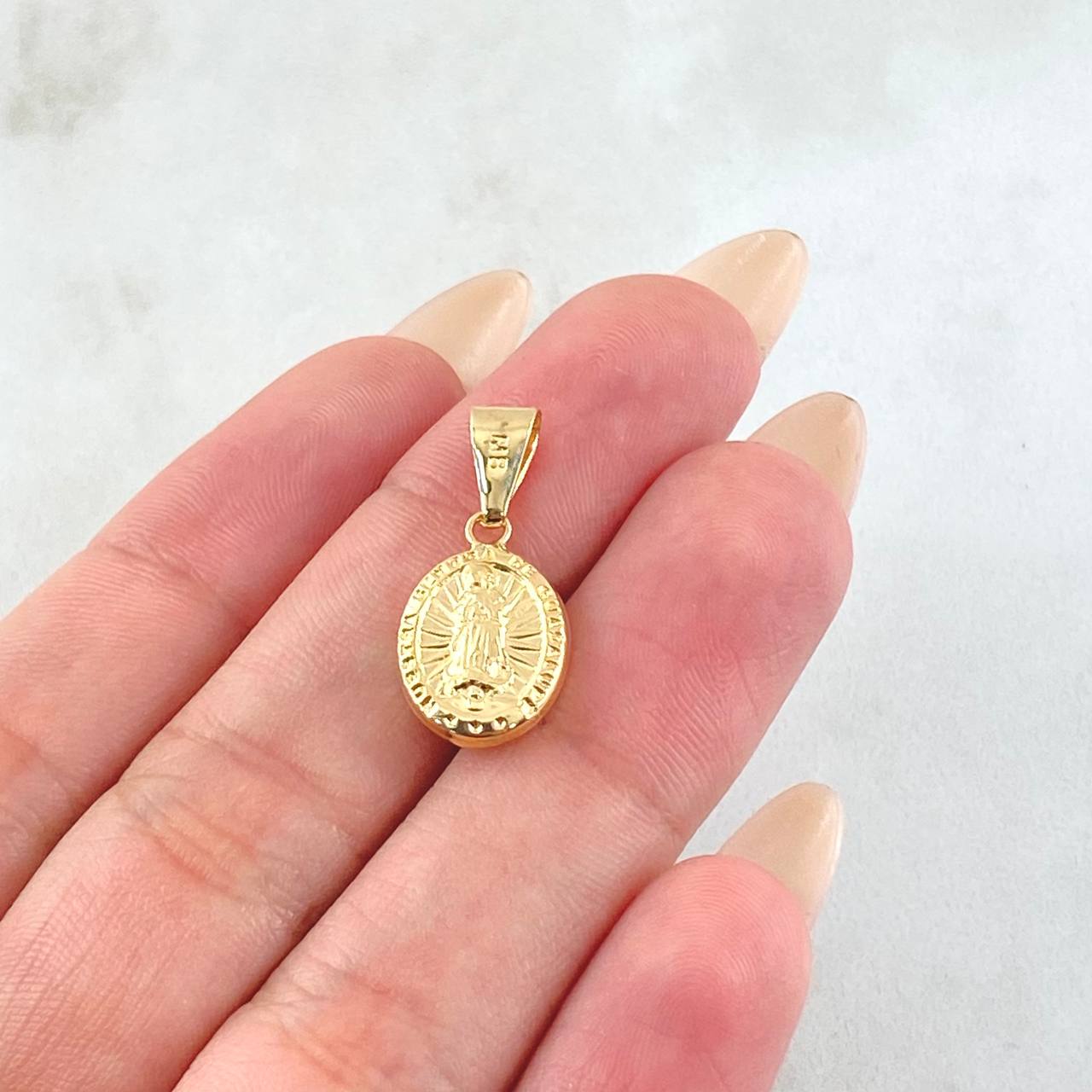 Dije Virgen Guadalupe 0.85gr / 1 in / Oro Amarillo 18K ©