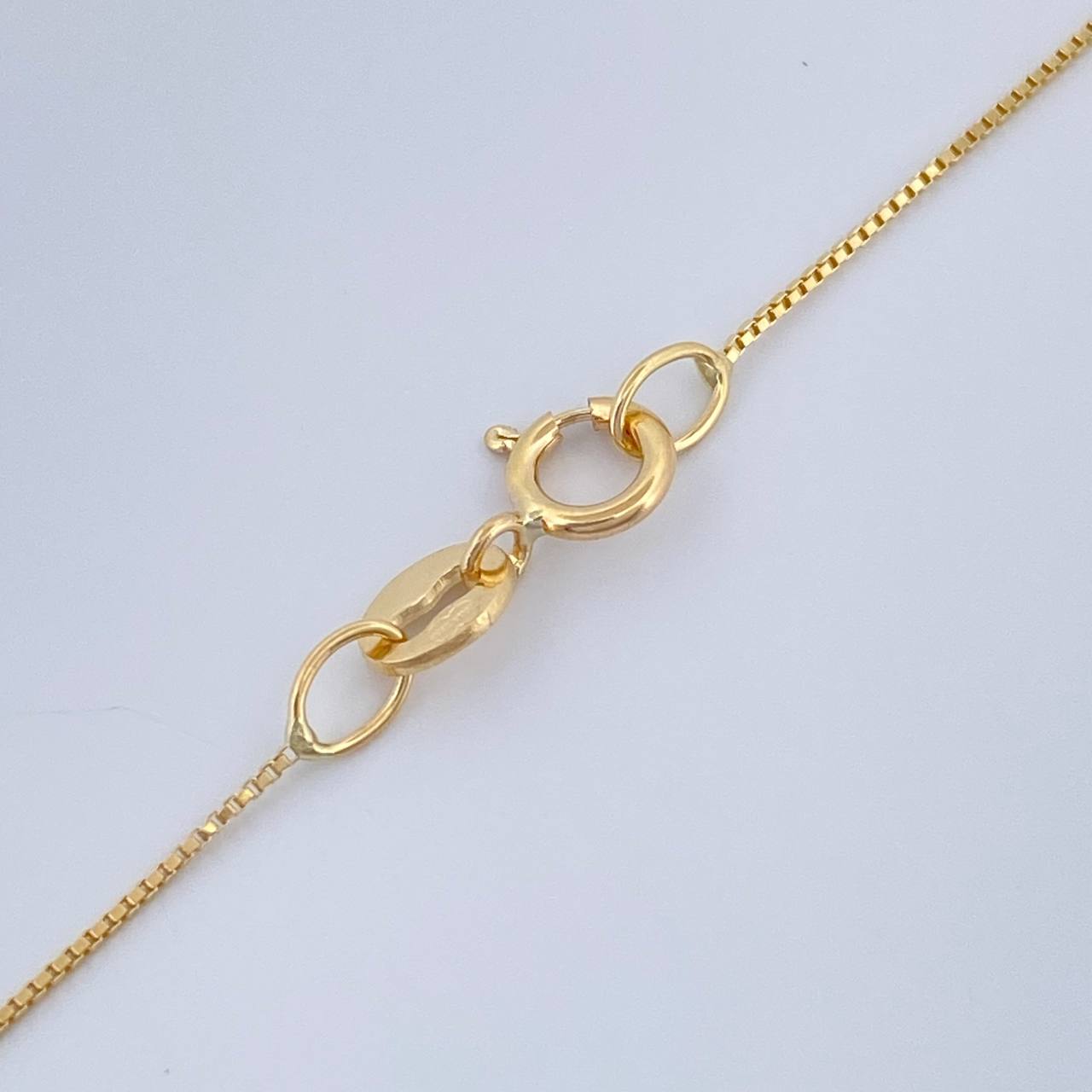 Set Veneciana + Halo Esmeralda 06pts 1.2gr / 19 3/4 in / 0.3mm Oro Amarillo 18K &