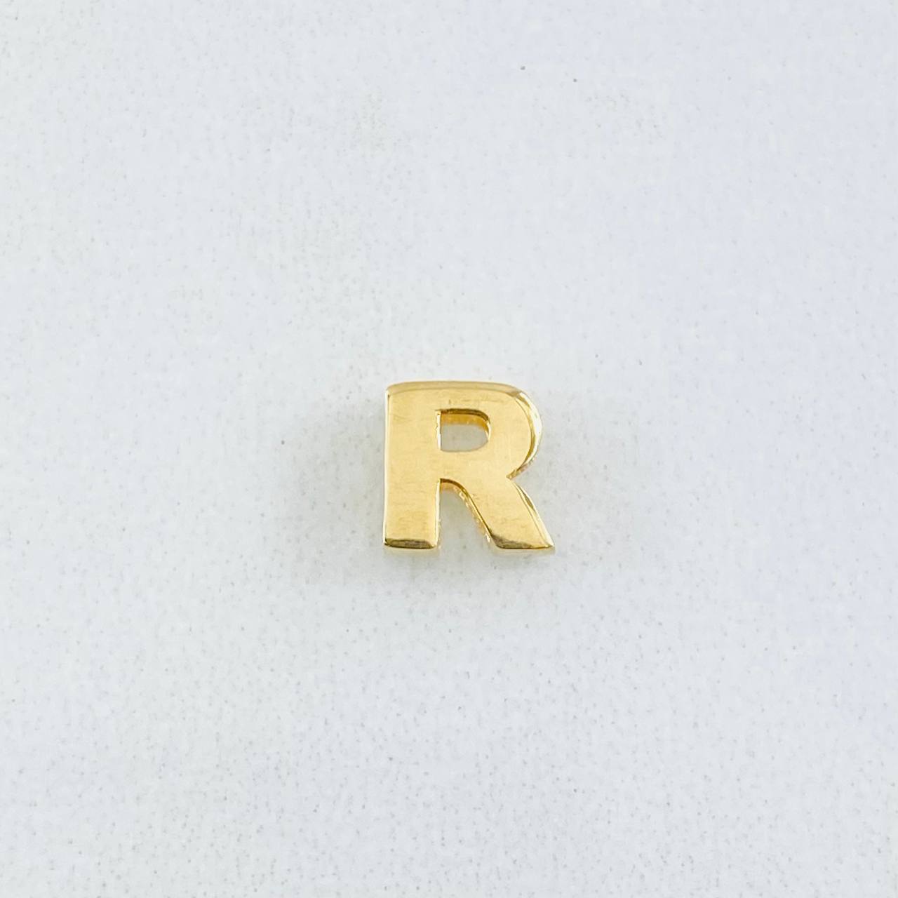 Herraje Letra R 0.35gr / 1/4 in / Oro Amarillo 18K