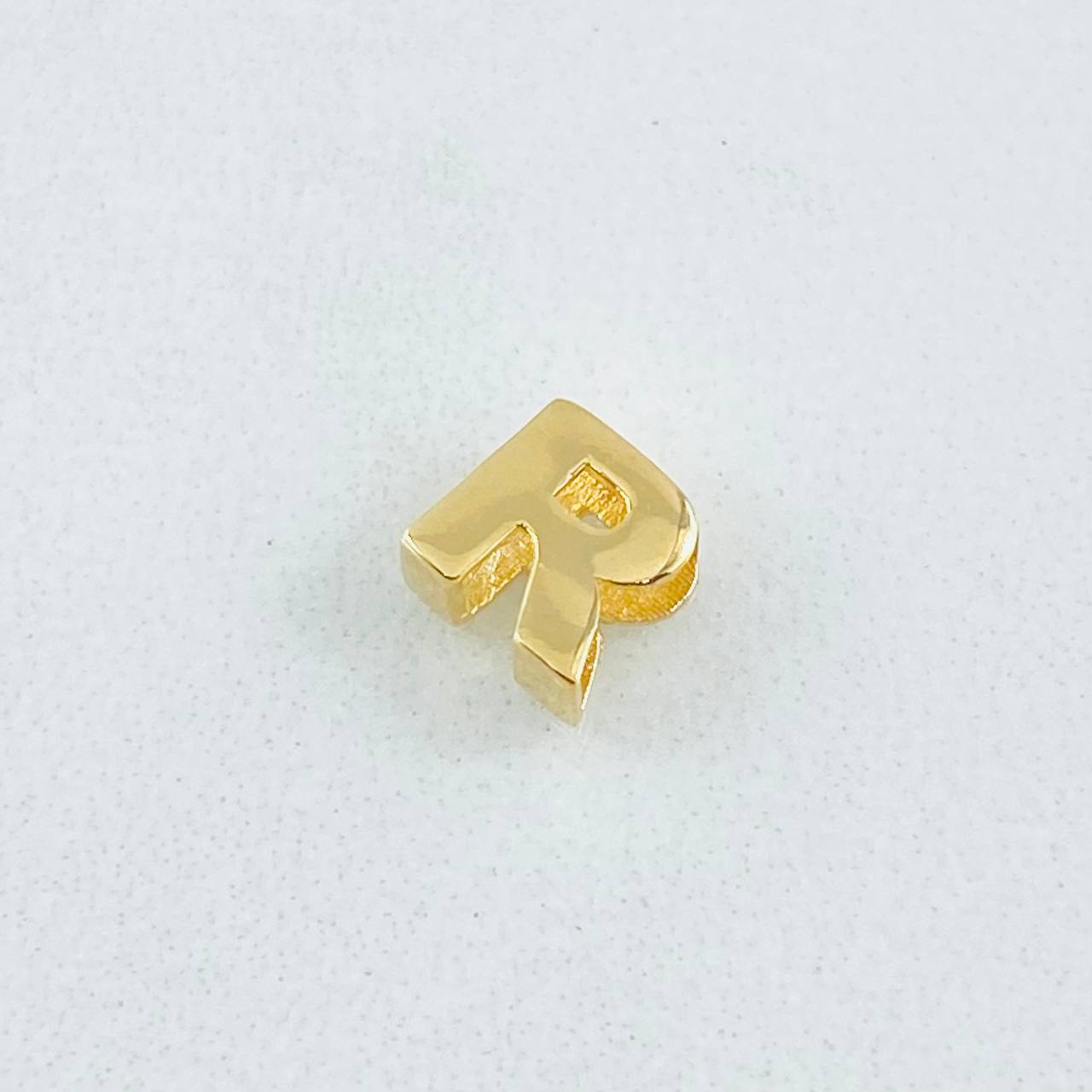 Herraje Letra R 0.35gr / 1/4 in / Oro Amarillo 18K