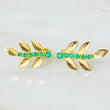 Topos Hojas de Muerdago Esmeraldas 30pts 2.6gr / Oro Amarillo 18K ©