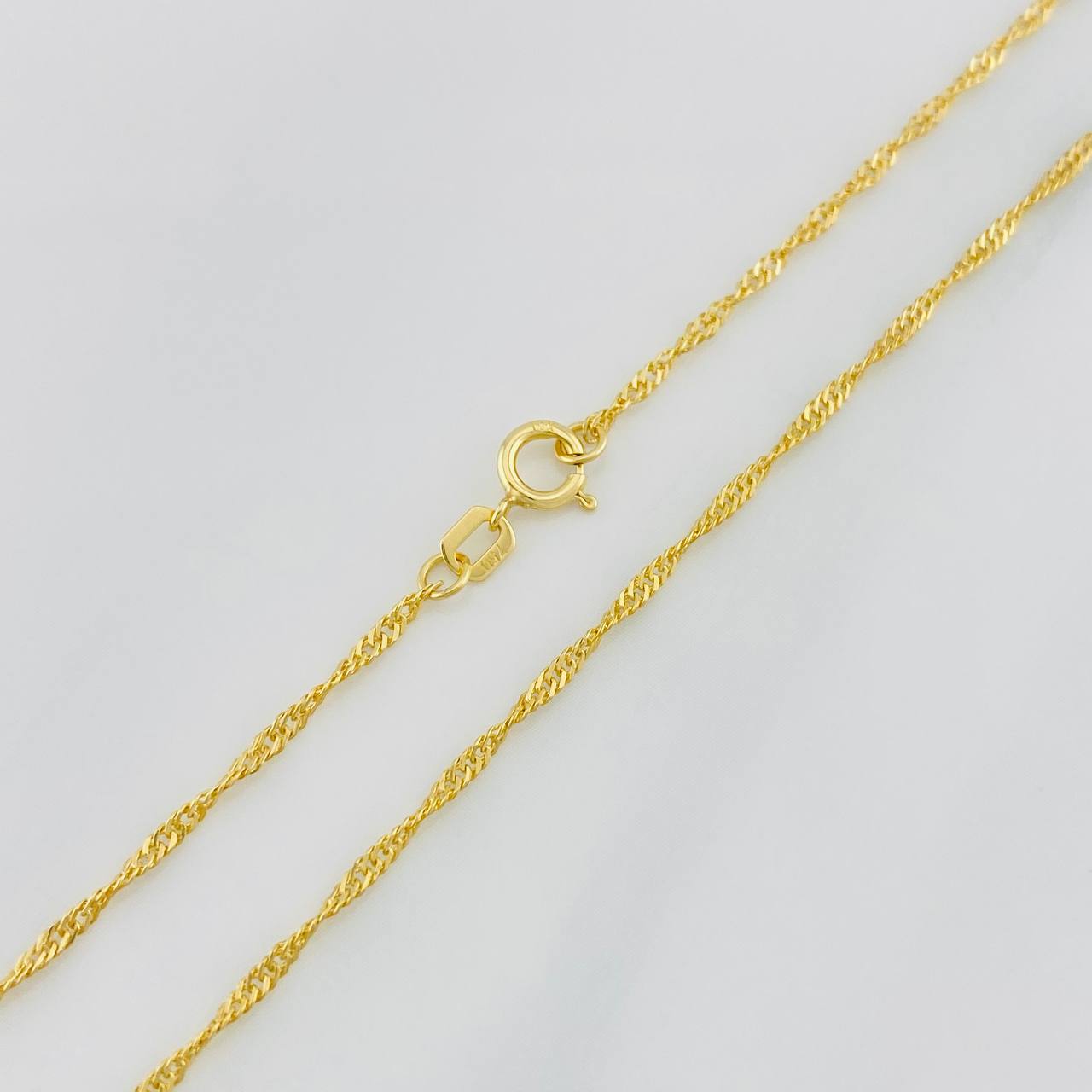 Cadena Singapur 1.25g / 24 in / 1.37mm Oro Amarillo 18K