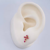 Topos Cruz Rubies 28pts 0.95gr / Oro Amarillo 18K &