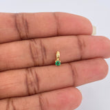 Dije Redondo Esmeralda 0.9pts 0.2gr / 1/4 in / Oro Amarillo 18K &