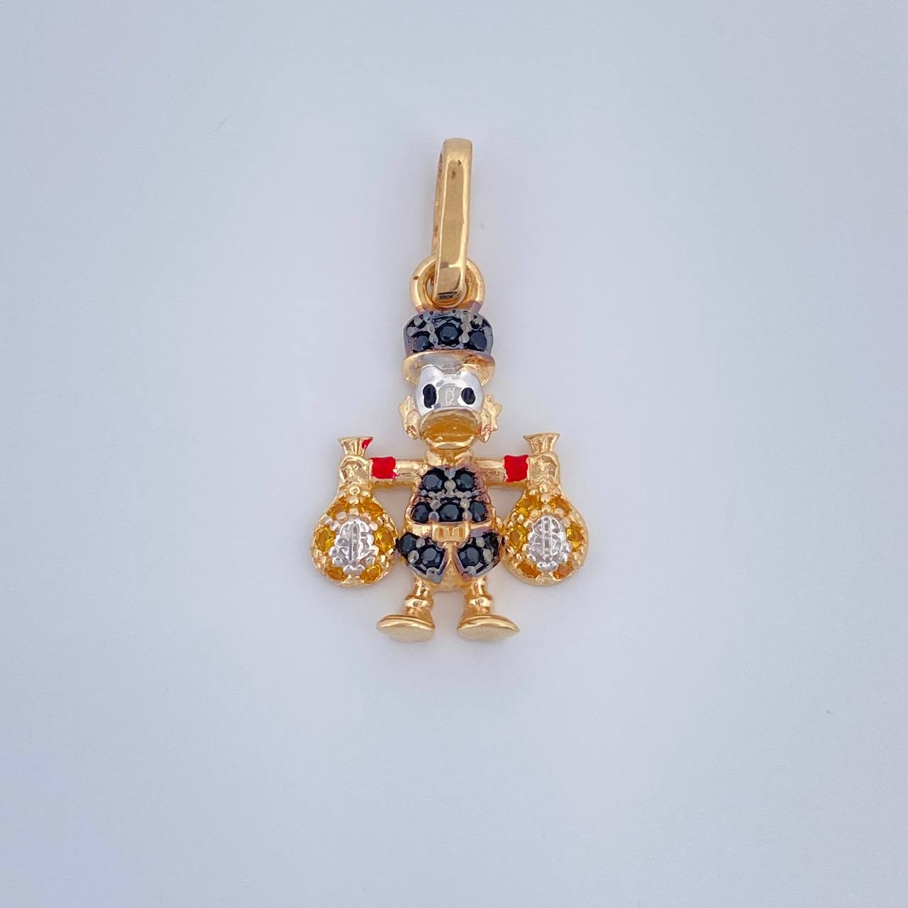 Dije Pato Bolsa de Dinero 1.55gr / 3/4 in / Tres Oros 18K $