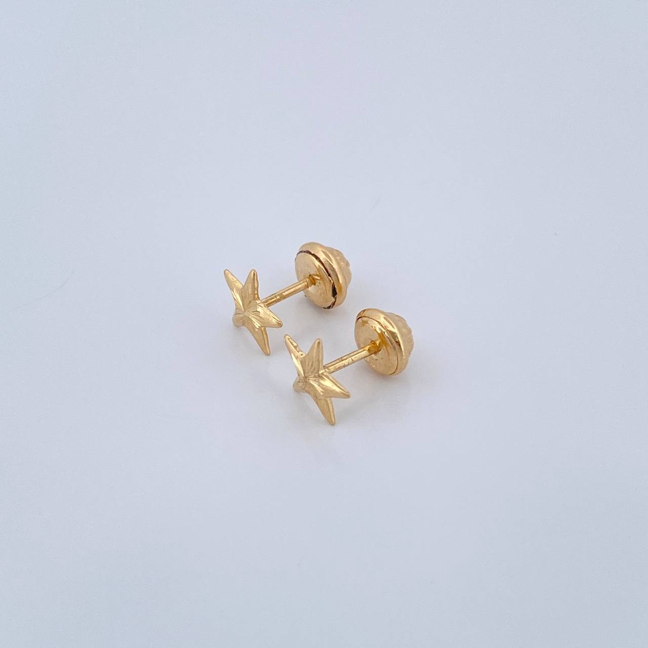 Topos Estrella 0.7gr / Oro Amarillo 18K %