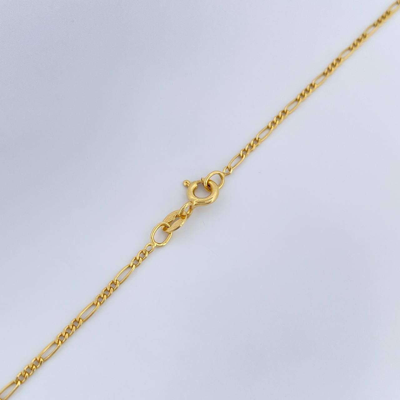 Cadena Figaro 1.4gr / 19 3/4 in / 1.35mm Oro Amarillo +1 18K $