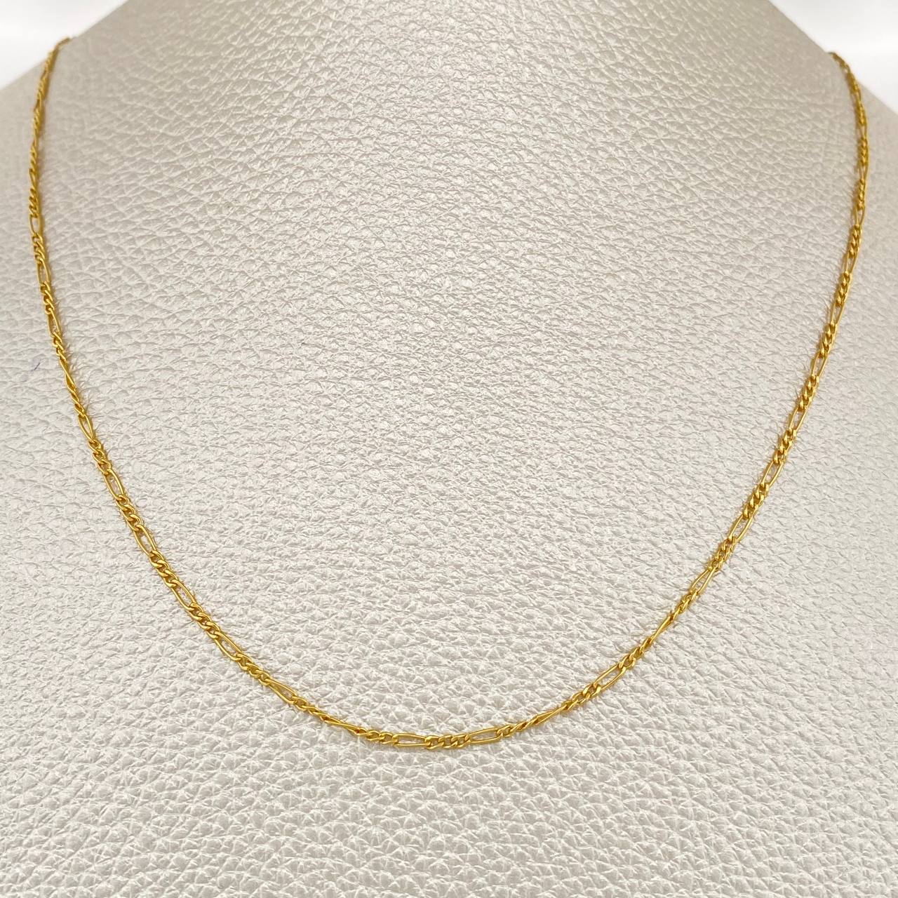 Cadena Figaro 1.4gr / 19 3/4 in / 1.35mm Oro Amarillo +1 18K $